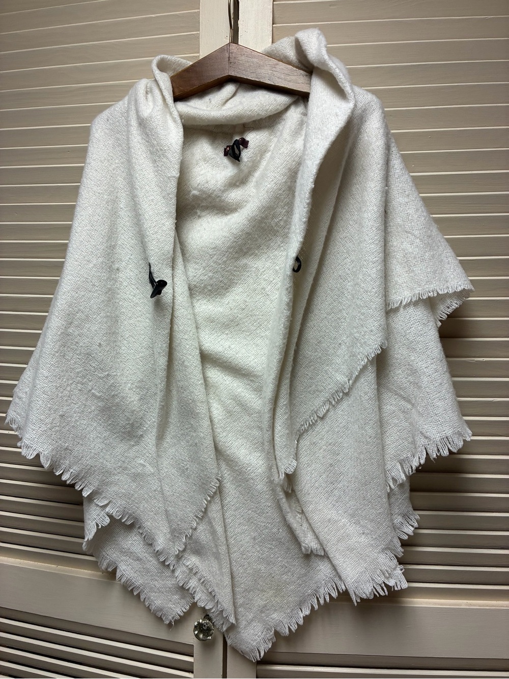 Women’s Hooded Fringe Poncho Sweater in Cream